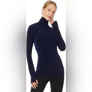 Norma Kamali designer Long Sleeved Turtleneck
Slim Fit, Navy 
Size: Medium